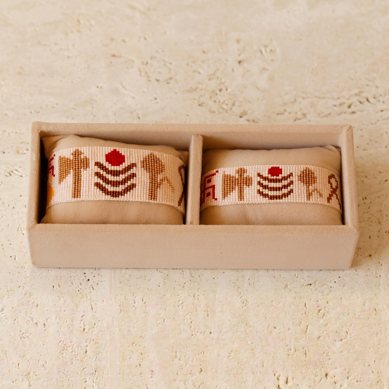 Ivory two-piece set on a flat ivory surface